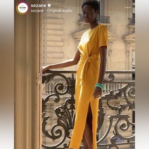 New condition iconic French Sezane Pippa dress in rare Saffron color. Worn once.